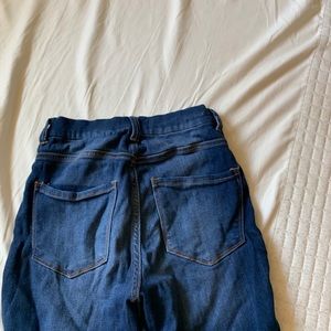 softest dark wash ripped jeans